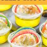 Pinterest graphic for Pot 'O Gold Jello Shots. Text says, "Vodka Pot 'O Gold Jello Shots shakedrinkrepeat.com." Image is overhead photo of Pot 'O Gold Jello Shots