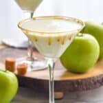Photo of Creamy Caramel Apple Martini with apples and caramels beside