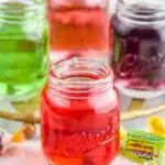 Photo of Jolly Rancher shots with Jolly Rancher candies beside